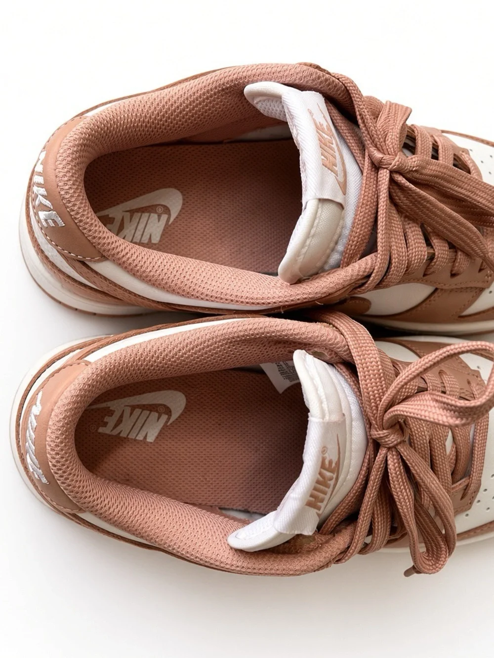Nike Women's Low-Top Sneakers in Dusty Rose and White